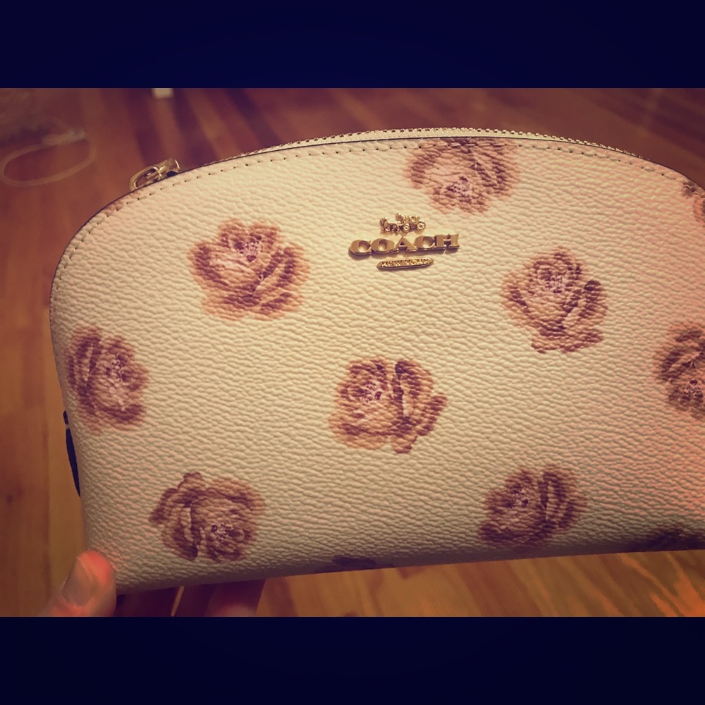 Never been used Coach cosmetic case